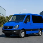 Front three-quarter view of blue TOURWAY T5 commercial vehicle