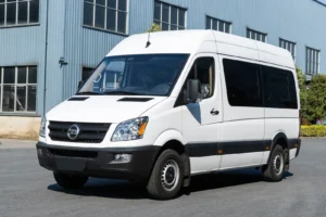 Front three-quarter view of white TOURWAY T6 commercial vehicle