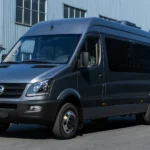 Front three-quarter view of gray TOURWAY T7 commercial vehicle