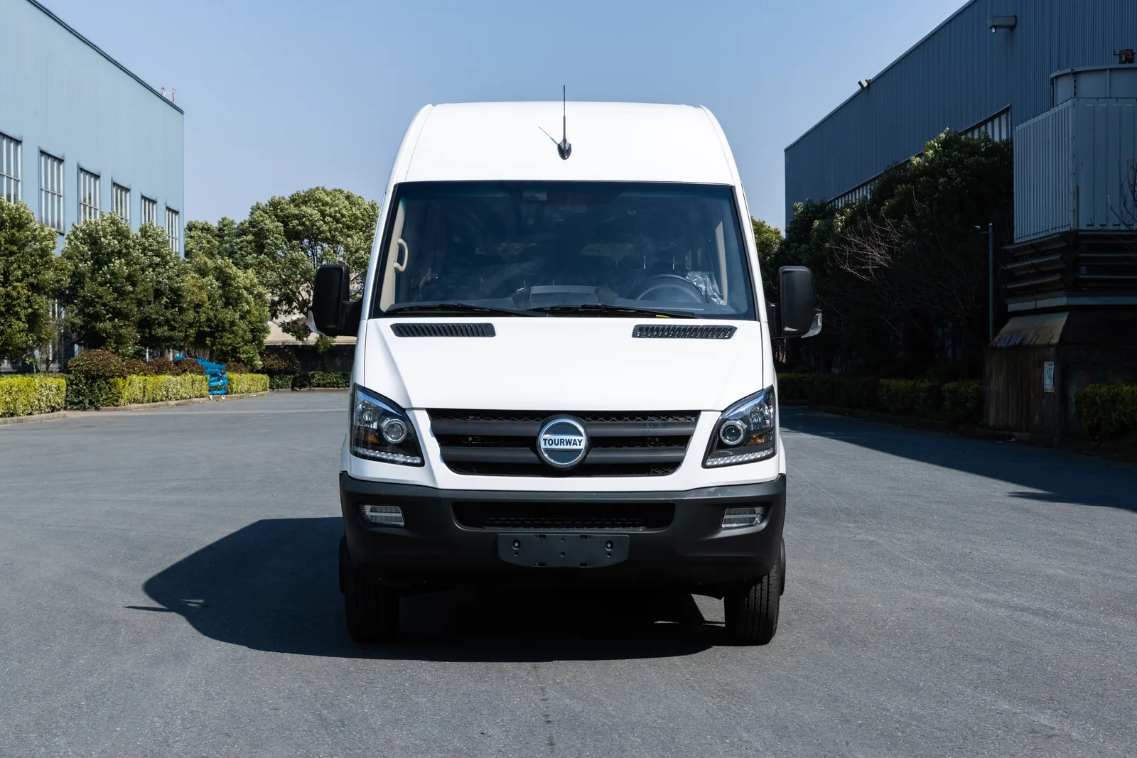 Front view of white TOURWAY T8 commercial vehicle